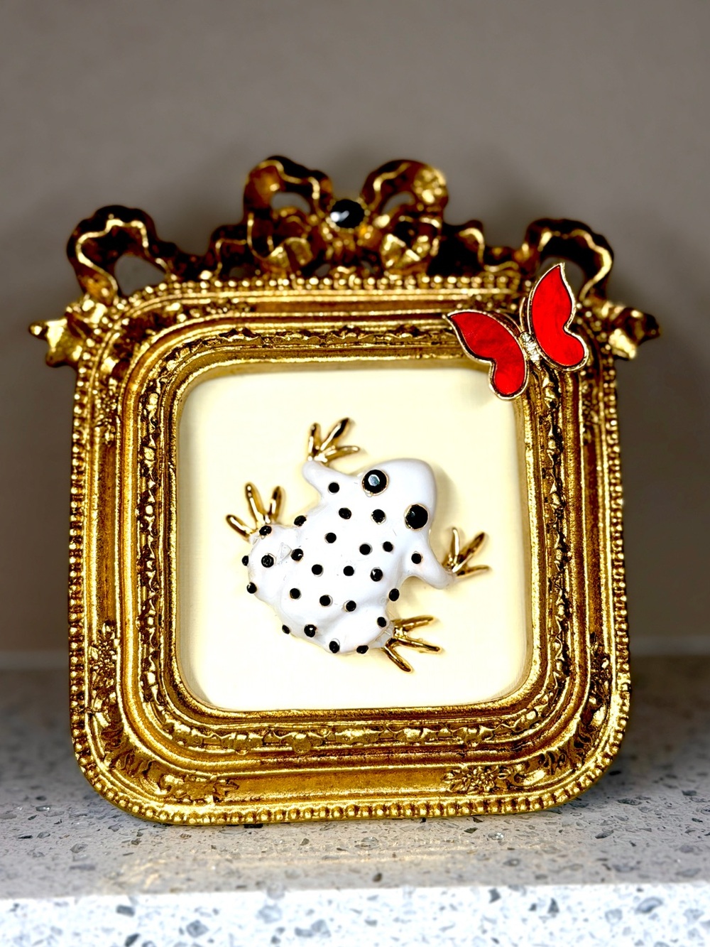 Framed Enamel Frog & Butterfly Art – Gold Bow Frame
